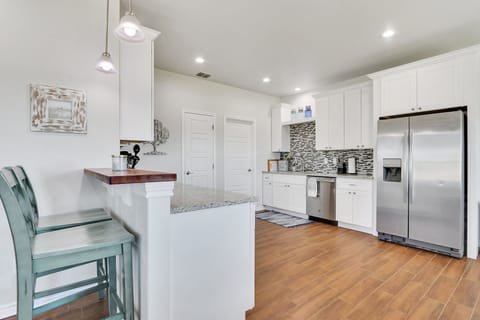 Full kitchen with stainless steel appliances