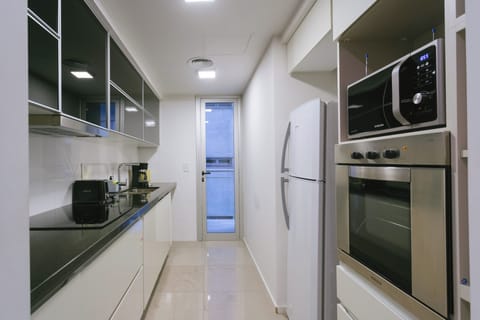 Apartamento 2 ambientes | Private kitchen | Microwave, oven, stovetop, coffee/tea maker