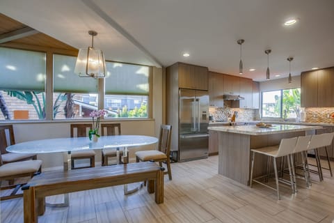 Large open kitchen with eat in dining space.