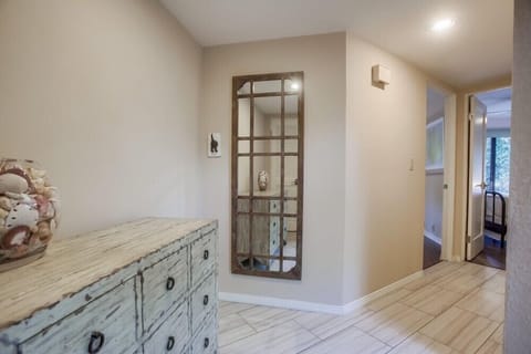 Downstairs foyer leads to the bedrooms and bathroom.