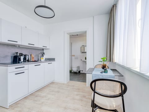 Suite M | Private kitchen | Fridge, coffee/tea maker, toaster, dining tables