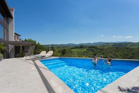 Seasonal outdoor pool, a heated pool