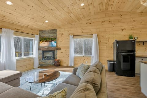Living room with Samsung smart tv and electric fireplace