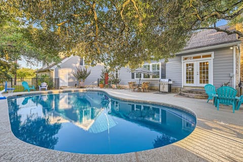 Take a dip in your private backyard swimming pool.