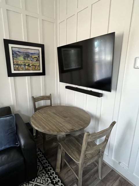 Tables expands for larger dining space or work area.