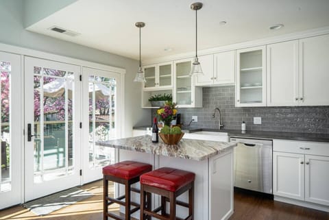 Full kitchen and island for more cooking space