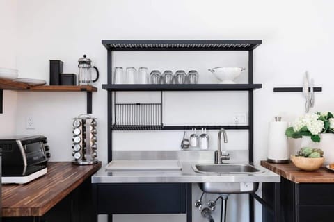 Modern/industrial kitchenette with all the essentials.