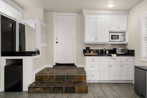 Kitchenette & four burner electric stove