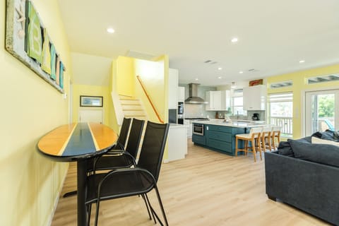 Grab a snack at the high top table - modeled after a surf board