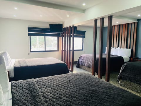 Premium Quadruple Room | Premium bedding, desk, free WiFi, bed sheets