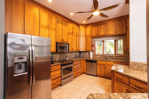 Premier Condo | Private kitchen | Full-size fridge, microwave, oven, stovetop