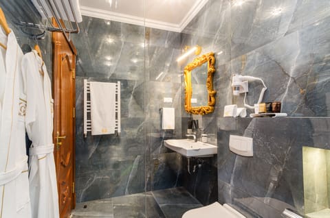 Superior Room | Bathroom | Designer toiletries, hair dryer, bathrobes, slippers