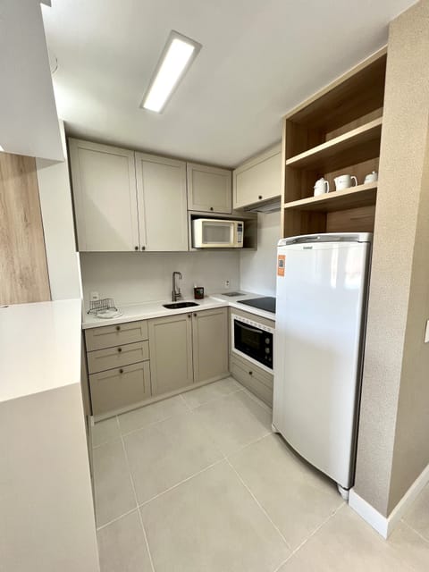 Deluxe Room, Sea View | Private kitchen | Fridge, microwave