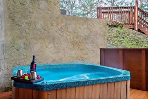 Hot Tub — perfect for soaking away the day’s stress and enjoying serene moments. Whether you’re unwinding under the stars or warming up on a cool evening, this luxurious hot tub is designed to make every stay unforgettable.