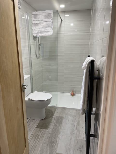 Hair dryer, towels, soap, shampoo