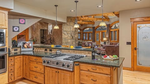 Gourmet kitchen looking into great room