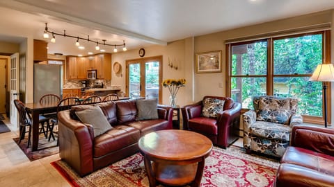Living room open to the dining room and kitchen