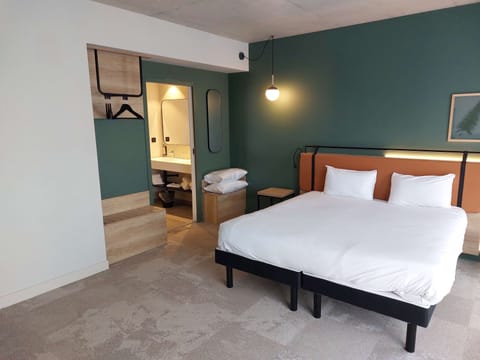 Premium bedding, desk, laptop workspace, soundproofing