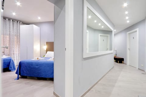 Triple Room | Frette Italian sheets, premium bedding, down comforters