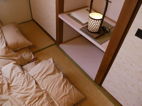 Japanese-Style Twin Room with Shared Bathroom | In-room safe, blackout drapes, free WiFi, bed sheets