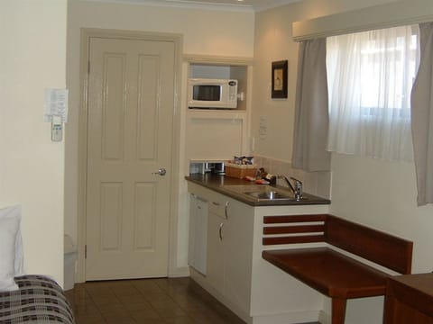 Family Room | Private kitchenette | Fridge, microwave, coffee/tea maker, electric kettle