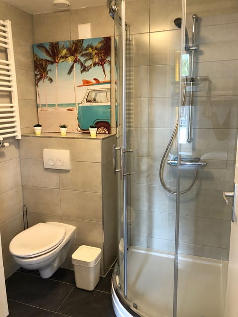 Basic Shared Dormitory | Bathroom | Shower, hair dryer, towels