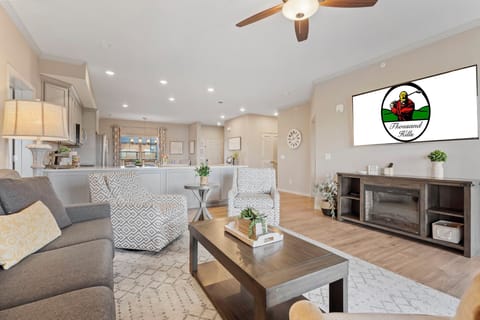 Beautifly Furnished Living Room with Cable TV, Sunroom, and Deck Access