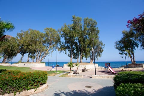 On the beach, sun loungers, beach umbrellas, beach towels