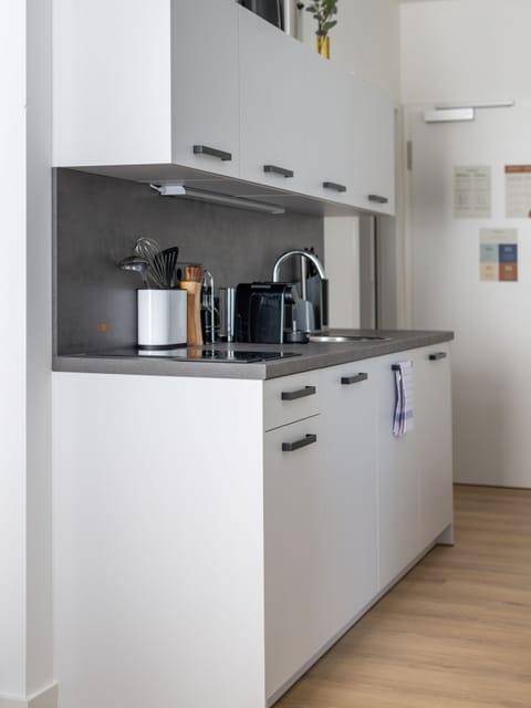 Suite M | Private kitchen | Fridge, coffee/tea maker, toaster