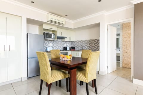 Bay Residence | Private kitchen | Fridge, electric kettle