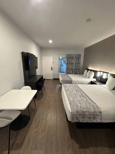 2 Queen Beds - Newly Renovated Room | Blackout drapes, free WiFi, bed sheets