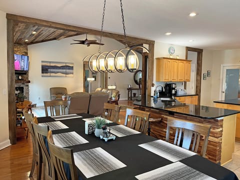 The Main Level is laid out to flow nicely without interrupting work area making entertaining and cooking a pleasure! Dining table will seat 10, with 5 more seats at the breakfast bar area.