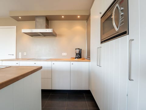 Flooring, Cabinetry, Wood, Kitchen, Interior Design, Countertop, Floor, Ceiling, Kitchen Appliance, Light Fixture