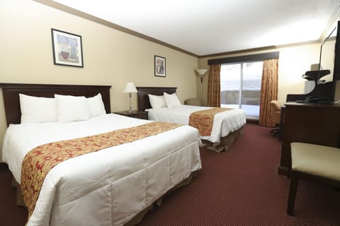 Queen Room with Two Queen Beds, Ground Floor | Desk, blackout drapes, iron/ironing board, free WiFi