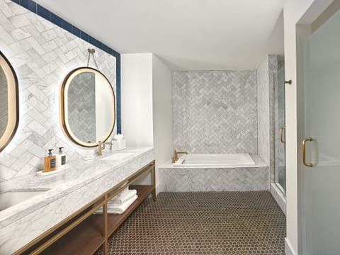 Premier King Suite | Bathroom | Designer toiletries, hair dryer, bathrobes, slippers