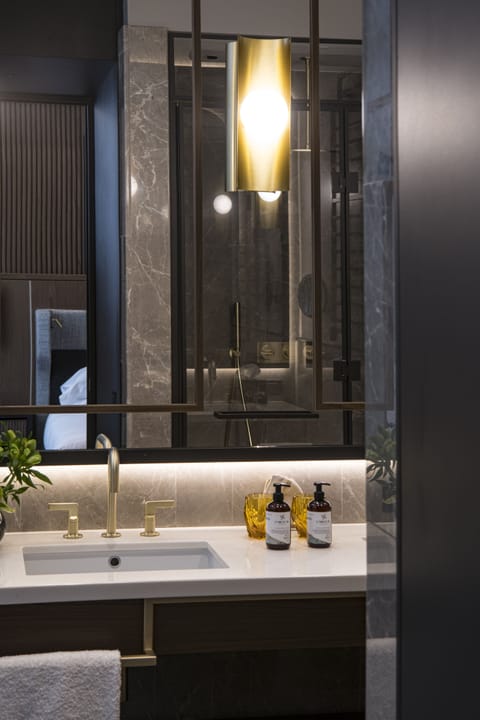 Superior Room | Bathroom | Shower, rainfall showerhead, designer toiletries, hair dryer