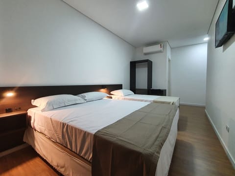 Family Triple Room | Desk, free WiFi, bed sheets