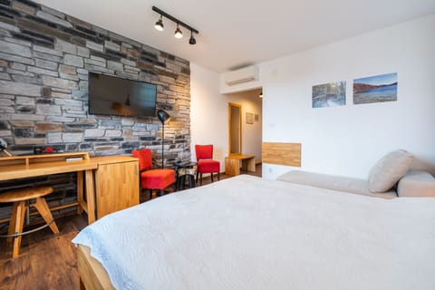 Comfort Triple Room, Mountainside | In-room safe, desk, soundproofing, free WiFi