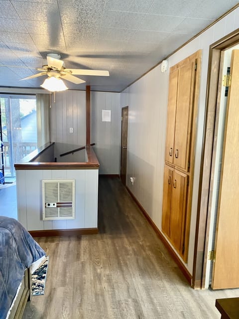 Hallway and stairway, Leading to the main level with a built in electric heater