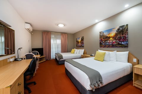 Deluxe King Family (4) Room (No Pets) | Pillowtop beds, minibar, individually decorated, individually furnished