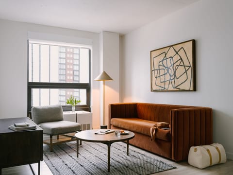 Deluxe Apartment, 1 Bedroom | Living area | Flat-screen TV