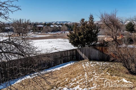 Take in the views of the nearby playground and lake from the huge fenced in backyard.