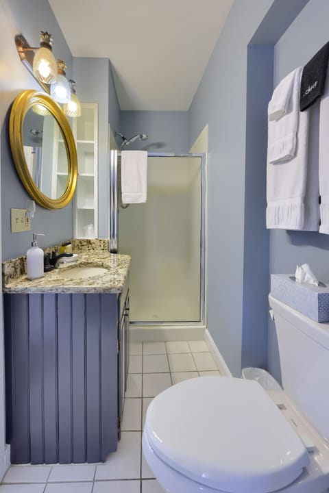 Suite, Multiple Beds | Bathroom | Shower, towels, soap, shampoo