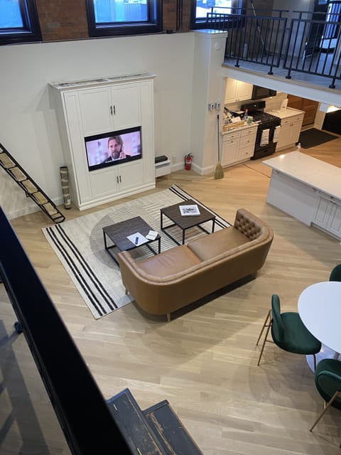 View of Murphy bed with built in 50" Samsung "The Frame" smart television set.