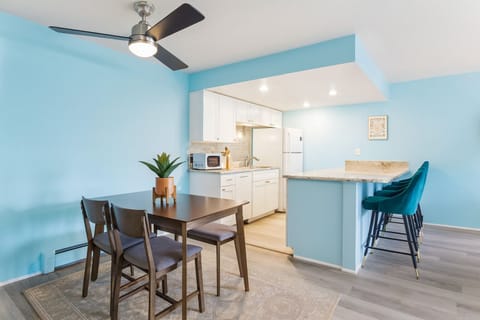 This dining space is seamlessly connected to the kitchen and the living room