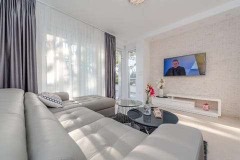 Deluxe Apartment, Private Pool, Sea View | Living area | LED TV