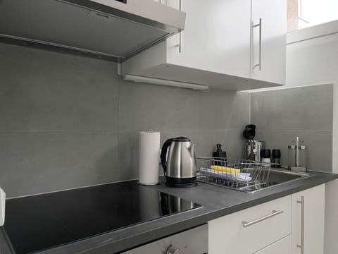 Deluxe Studio | Private kitchen | Full-size fridge, microwave, toaster, cookware/dishes/utensils