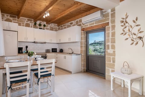 Villa | Private kitchen | Full-size fridge, microwave, oven, stovetop