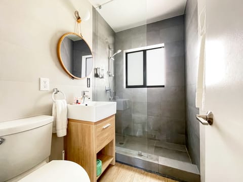 Apartment | Bathroom | Shower, designer toiletries, hair dryer, towels