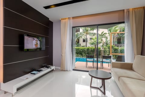 Junior Suite, Pool Access | Living area | LCD TV